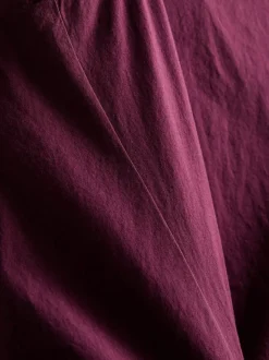 Camiseta sin mangas con bajo curvo
