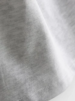 Camiseta sin mangas con ribetes festoneados