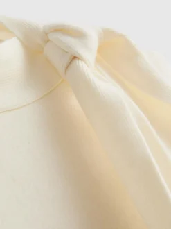 Camiseta sin mangas de punto con lazo al cuello
