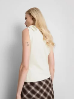 Camiseta sin mangas de punto con lazo al cuello