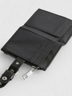 Cartera con cremallera y textura