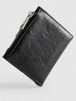 Cartera con cremallera y textura
