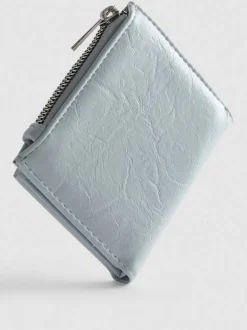 Cartera con cremallera y textura