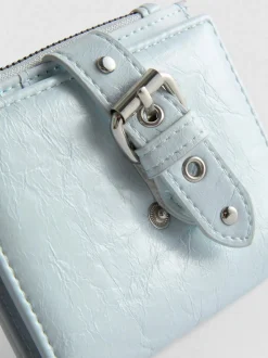 Cartera con cremallera y textura