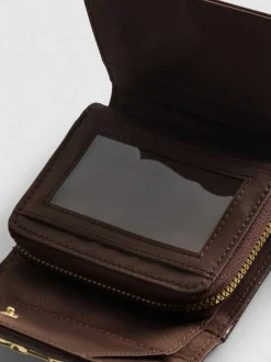 Cartera con detalle de bocado de caballo