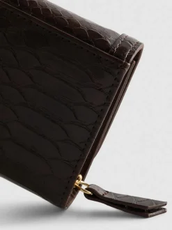 Cartera con detalle de bocado de caballo
