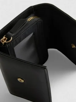 Cartera con detalle de bocado de caballo