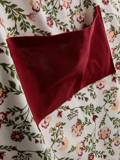 Delantal floral con bolsillo