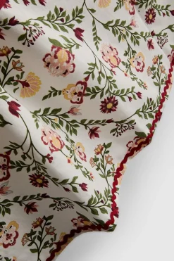 Delantal floral con bolsillo