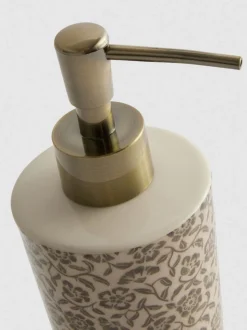 Dispensador de jabón con flores
