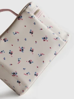 Estuche tocador de piel sintética con diseño floral