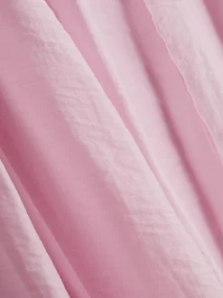 Falda midi amplia con detalles de costuras