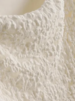 Falda midi de encaje con textura en mezcla de algodón