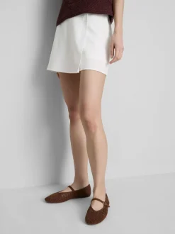Falda pantalón corta en mezcla de lino con lazada