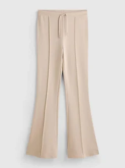 Joggers acampanados con alforzas y algodón