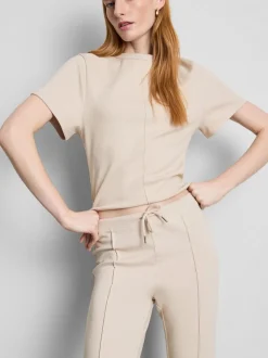Joggers acampanados con alforzas y algodón