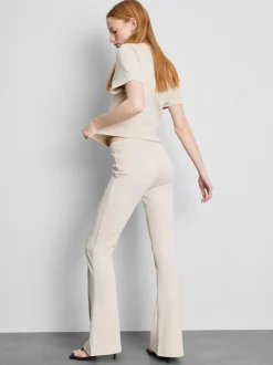 Joggers acampanados con alforzas y algodón