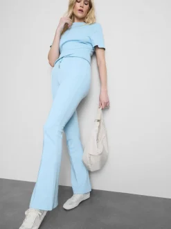 Joggers acampanados con alforzas y algodón