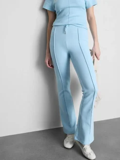 Joggers acampanados con alforzas y algodón