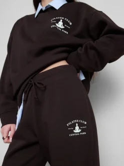 Joggers ajustados estampados en mezcla de algodón