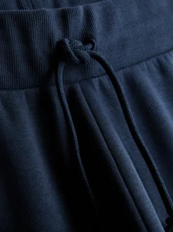 Joggers ajustados estampados en mezcla de algodón