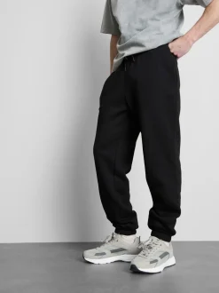 Joggers con cinturilla elástica y bajos ajustados