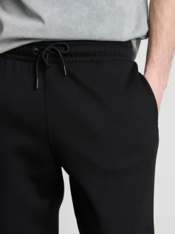 Joggers con cinturilla elástica y bajos ajustados