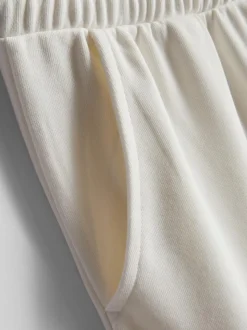 Joggers de pernera ancha con algodón