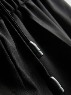 Joggers de vestir de pernera ancha