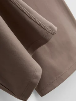 Leggings deportivos acampanados de talle alto