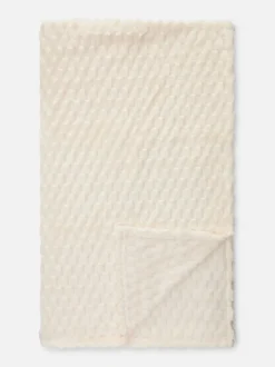 Manta extrasuave con textura de nido de abeja