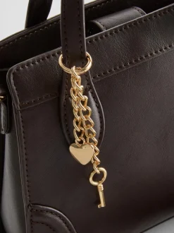 Minibolso con asas
