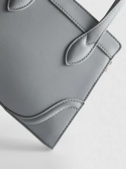 Minibolso con asas