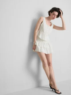 Minifalda bordada de algodón a capas