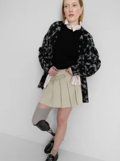 Minifalda plisada con cinturón