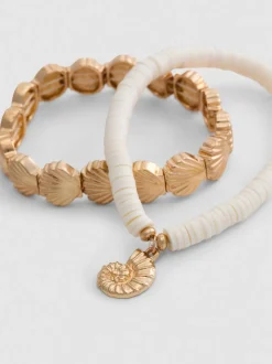 Pack de 2 pulseras con colgantes de conchas