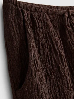 Pantalón corto fruncido con cordón de ajuste