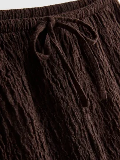 Pantalón corto fruncido con cordón de ajuste