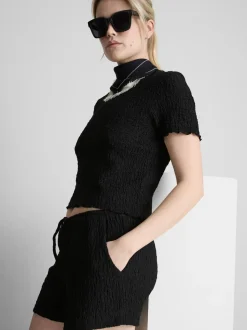 Pantalón corto fruncido con cordón de ajuste