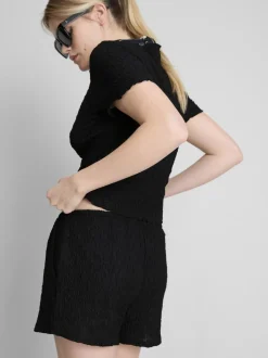 Pantalón corto fruncido con cordón de ajuste