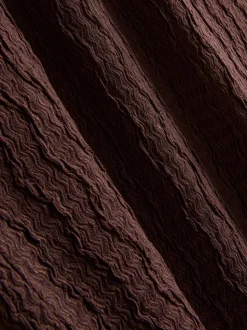 Pantalones anchos con efecto fruncido