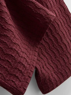 Pantalones anchos con efecto fruncido