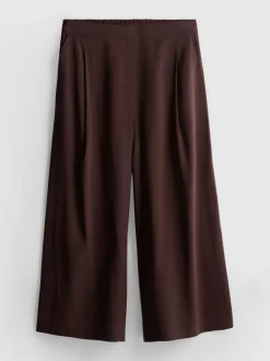 Pantalones anchos tipo culotte de talle medio