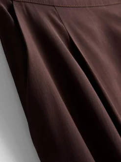 Pantalones anchos tipo culotte de talle medio
