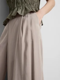 Pantalones anchos tipo culotte de talle medio