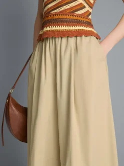 Pantalones bombachos con pinzas de tacto suave