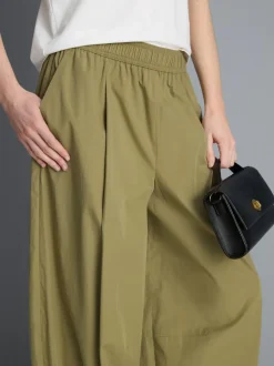 Pantalones bombachos con pinzas de tacto suave