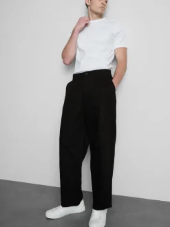 Pantalones chinos holgados de tiro medio