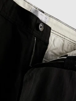 Pantalones chinos holgados de tiro medio