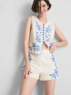 Pantalones cortos bordados con flores de algodón